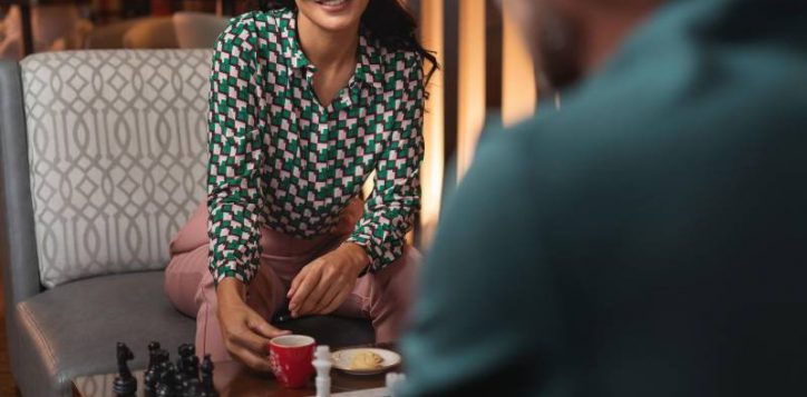 couple-playing-chess-in-yasmine-lounge-1-min-2